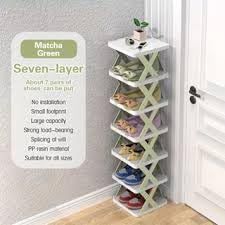 Space saving shaped shoe organizer in hallway
منظم أحذية موفر للمساحة في المدخل